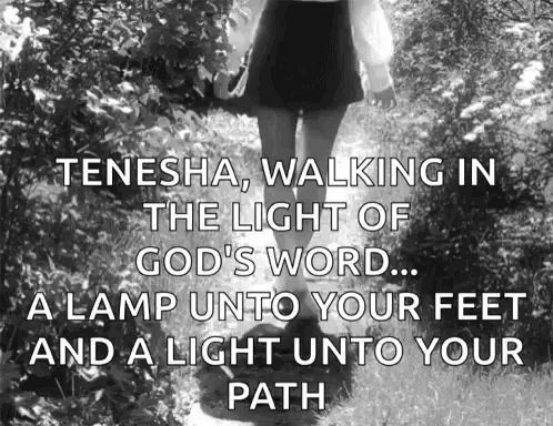 a woman walking in the light of god 's word a lamp unto your feet and a light unto your path