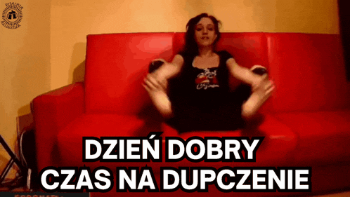 a woman is sitting on a red couch with the words dzien dobry i czas na dupczenie