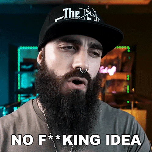 a man with a beard wearing a hat that says the truth on it