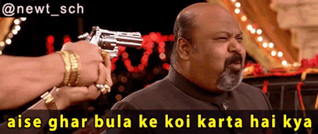 a picture of a man holding a gun with a caption that says aise ghar bula ke koi karta hai kya
