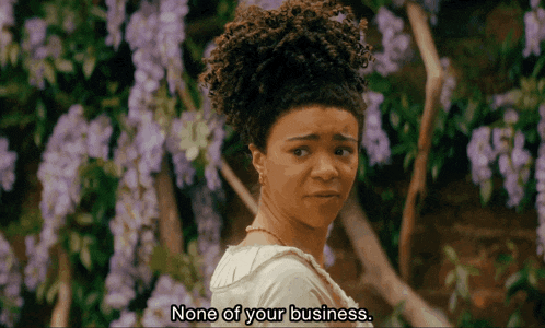 a woman in a white dress says none of your business