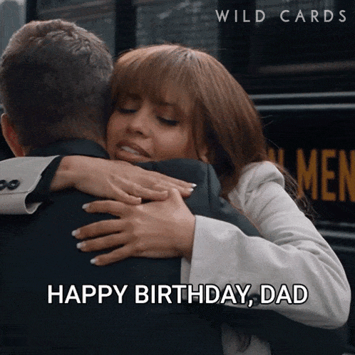 a woman hugging a man with the words " happy birthday dad " on the bottom
