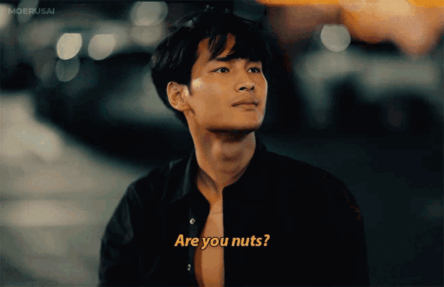 a man without a shirt is asking if he is nuts