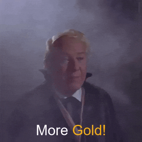 a man in a suit and tie with the words more gold below him