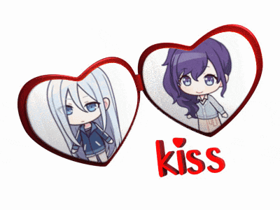 a couple of heart shaped frames with the word kiss below them
