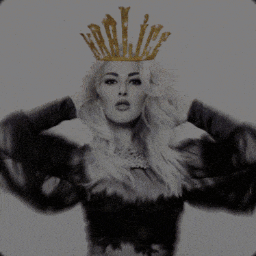 a woman with a crown on her head and the words huzur fearless