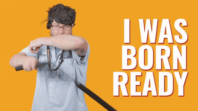 a man holding a pen in front of a yellow background that says " i was born ready "