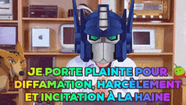 a cartoon of a robot with the words je porte plaine pour diffamation harcelement et incitation a la haine below it