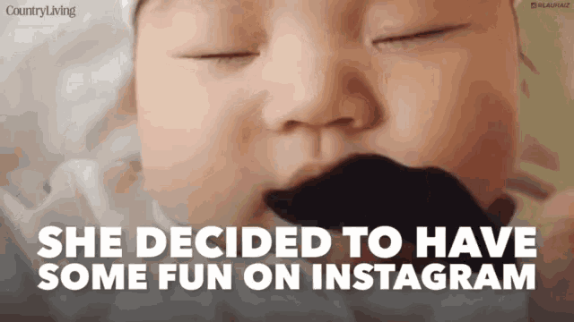 a baby with a fake mustache in its mouth and the caption she decided to have some fun on instagram