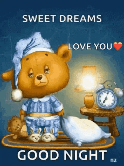 a teddy bear in pajamas is sitting on a tray with a pillow and an alarm clock ..