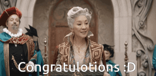a woman in a costume with the words congratulations : d on the bottom