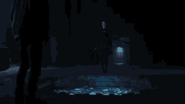 a woman in a black cloak is floating in the water .