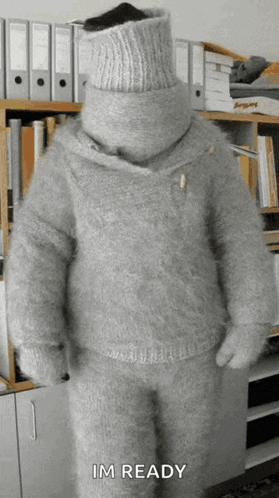 a person wearing a sweater with the word im ready on the bottom
