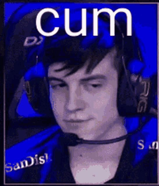 a man wearing headphones and a microphone with the word cum written on it