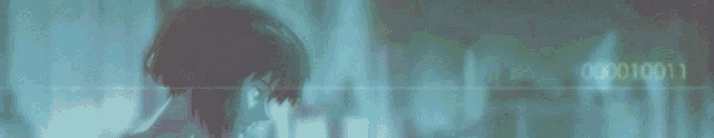 a blurry picture of a person standing in front of a blue background .
