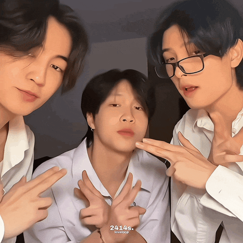three young men are posing for a picture and the number 24145 is on the bottom