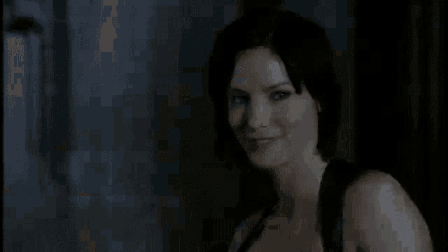 a woman is saying not really in a dark room