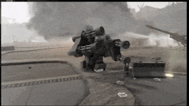 a video game screen shows a robot with a lot of guns on it