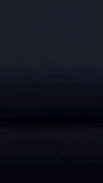 a purple fireworks display in the dark with a dark background