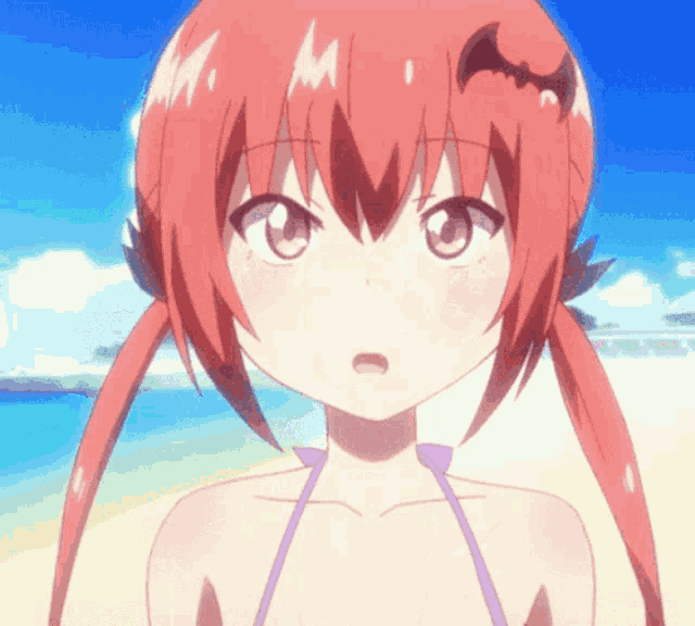 a girl with red hair and a bat on her head is standing on a beach