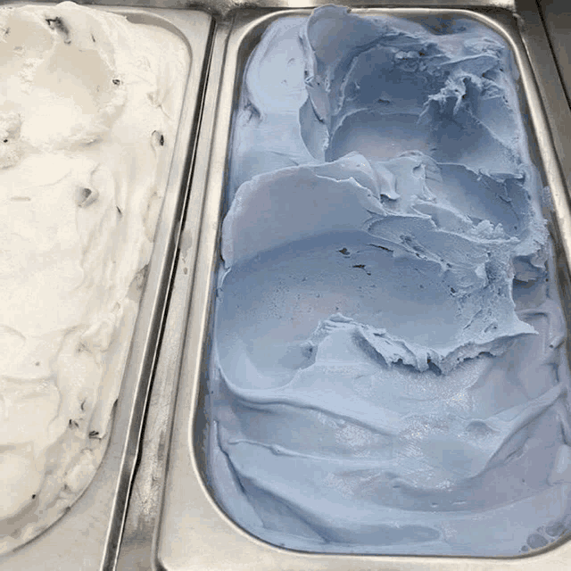 two containers of ice cream one of which is blue