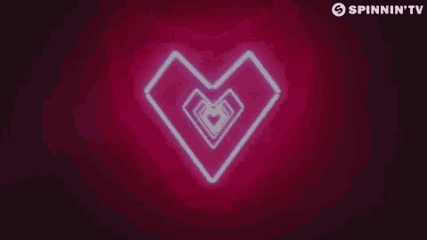 a pink background with a heart made of neon lights