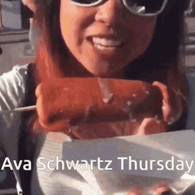 ava schwartz thursday is written on the bottom of a picture of a woman eating a hot dog