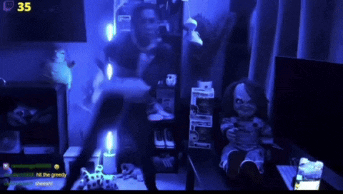 a video game is being played in a dark room