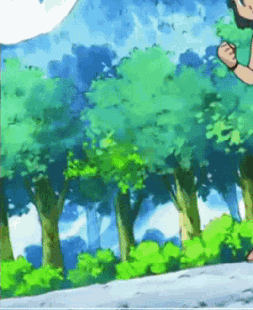 a person in a green shirt is running in the woods