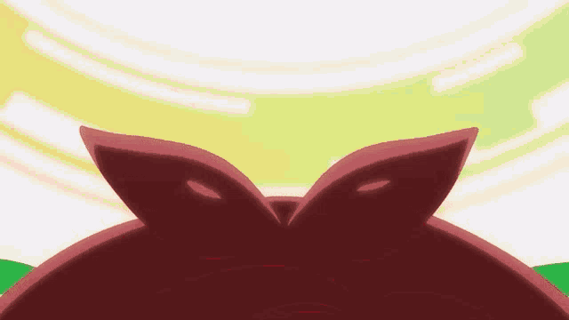 a close up of a cartoon character 's head with a bow