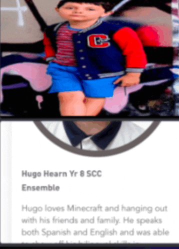 a picture of a little boy with the name hugo hearn on it