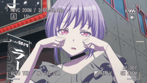 a girl with purple hair is being filmed by a camera with hevc 200m