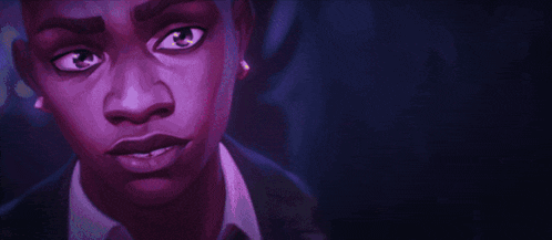 a close up of a person 's face with a dark background