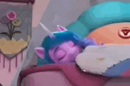 a cartoon pony is sleeping on a bed with a pillow .