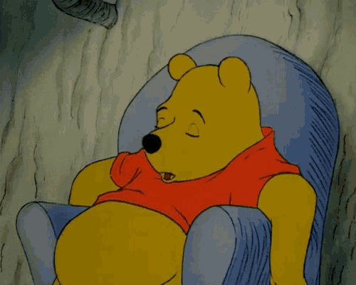 a cartoon of winnie the pooh sleeping in a chair with his eyes closed