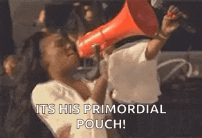 a man is holding a megaphone over a woman 's head .