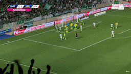 a soccer game is being played in a stadium with a banner that says ' soccer online ' on it