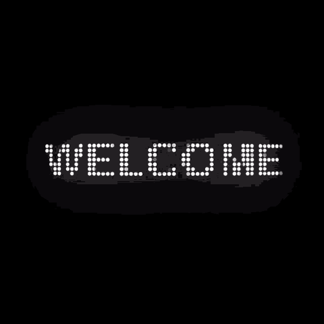 a black background with the word welcome written in white lights