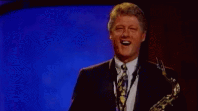 Saxophone - Bill Clinton GIF - Bill Clinton Laugh Laughing GIFs