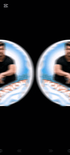 a blurry picture of a man sitting in a circle with the number 8 on the bottom