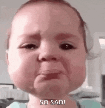 a baby is crying with tears coming out of his eyes and says `` so sad '' .