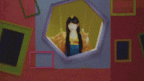 a picture of a woman with long hair is surrounded by colorful squares