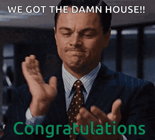 a man in a suit and tie applauds with congratulations written below him