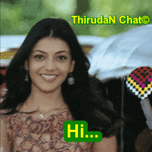 a picture of a smiling woman with a green hi sign