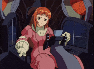 a girl in a pink dress is sitting in front of a monitor that says ' 00 00 00 ' on it