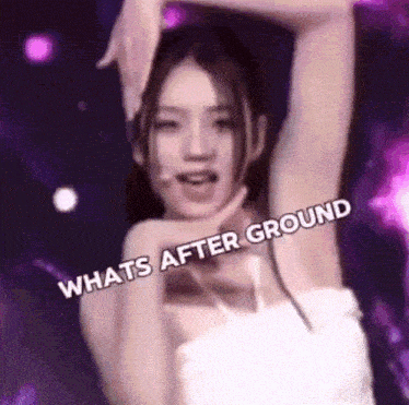 a woman in a white dress is dancing on a stage with her arms in the air and the words `` whats after ground '' .