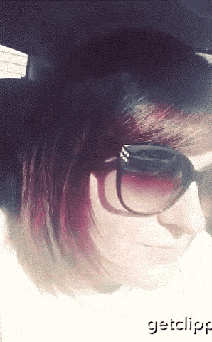 a woman wearing sunglasses has the word getclipp on the bottom left