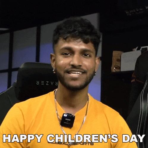 a man in a yellow shirt with the words happy children 's day below him