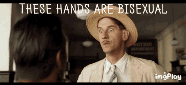 a man in a straw hat is talking to another man with the words these hands are bisexual above him