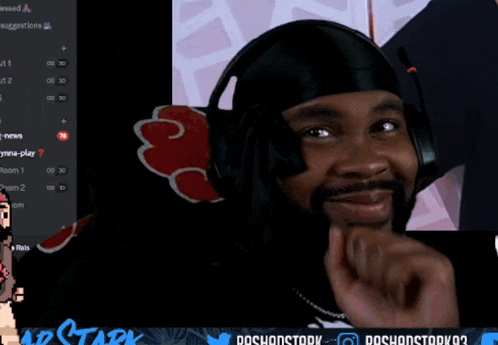 a man wearing headphones is smiling in front of a screen that says doshonstory 03